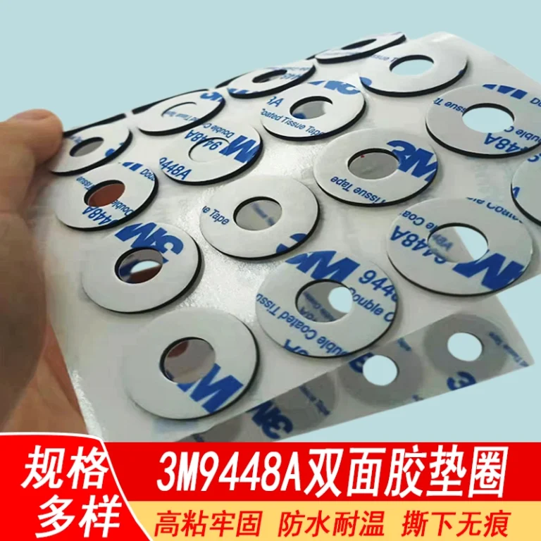 Hollow circular 3M9448A double‑sided adhesive gasket on release liner, industrial die‑cut adhesive spacer