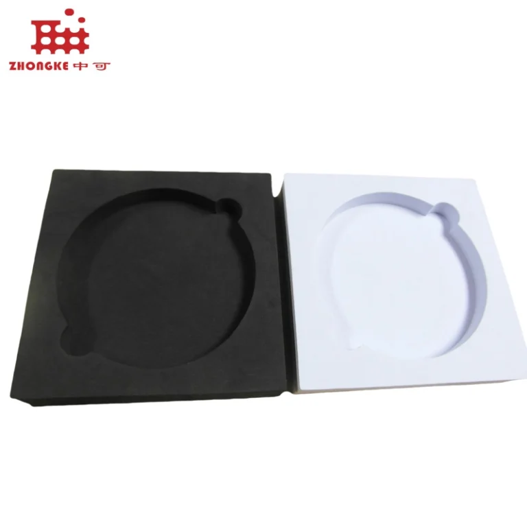 Industrial custom die‑cut EVA foam inner liner, black and white molded foam tray with special curved cavity for product fixing