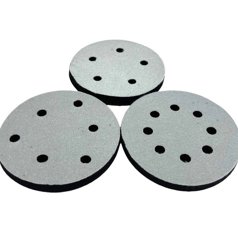 Grinding Pad, grey‑black perforated circular grinding pad
