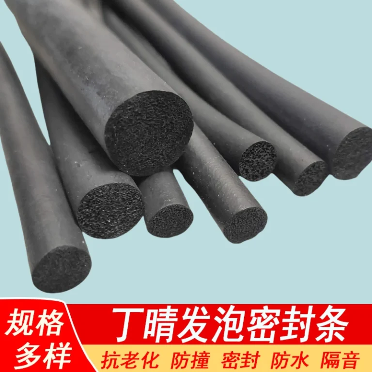 Multi‑diameter black NBR foamed sponge round rod showing porous cross‑section